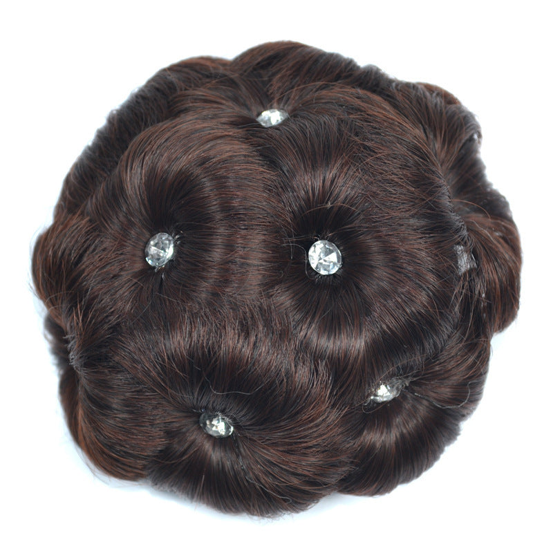 Women's clip-on hair bun with rhinestone-accented synthetic claw clip