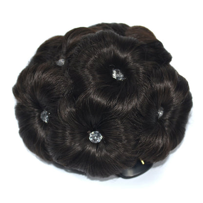 Women's clip-on hair bun with rhinestone-accented synthetic claw clip