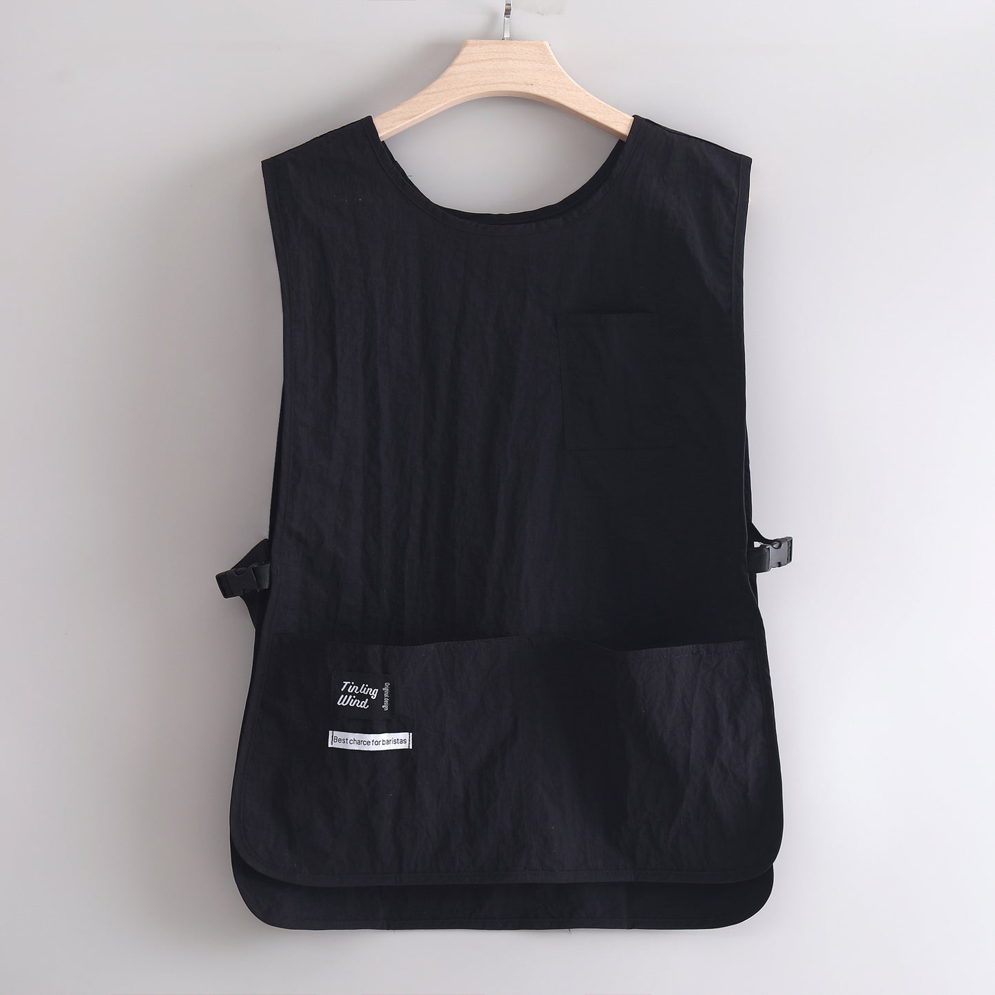 Sleeveless, multi-pocket, lightweight apron