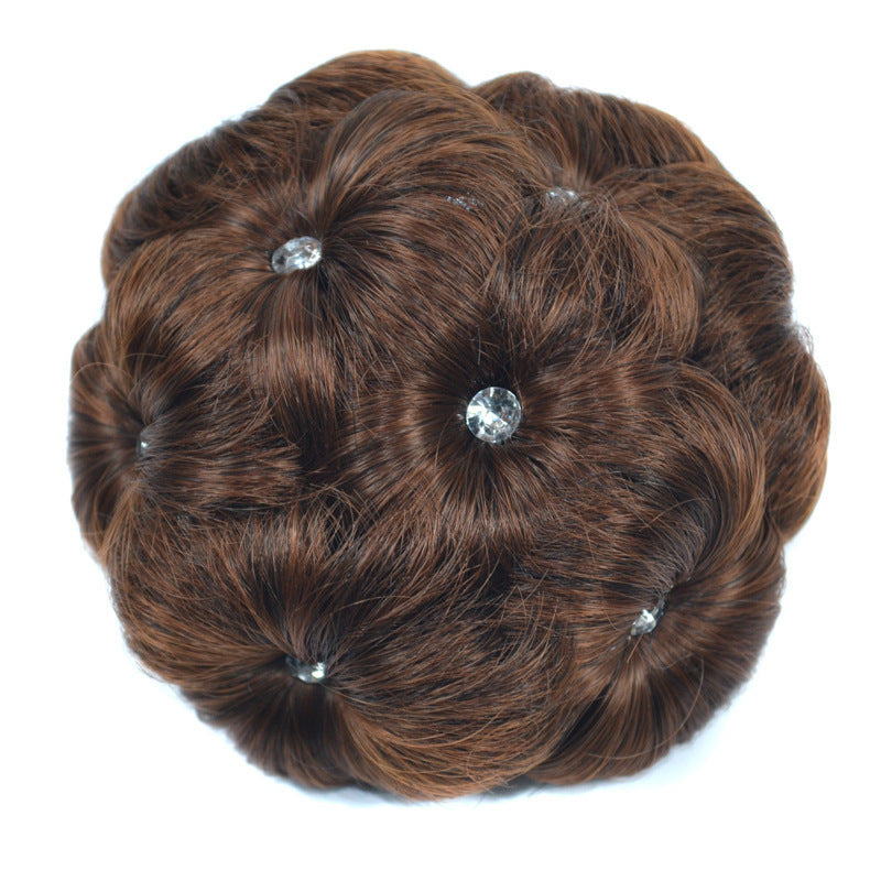 Women's clip-on hair bun with rhinestone-accented synthetic claw clip