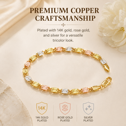Women's polished tri-color bracelet with floral engraving