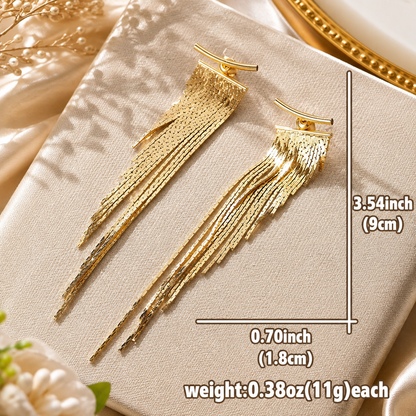 Women's gold tassel pendant earrings