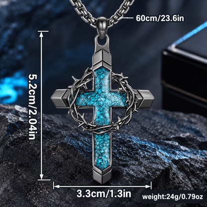 Turquoise cross pendant necklace featuring a crown of thorns and cross motif.
